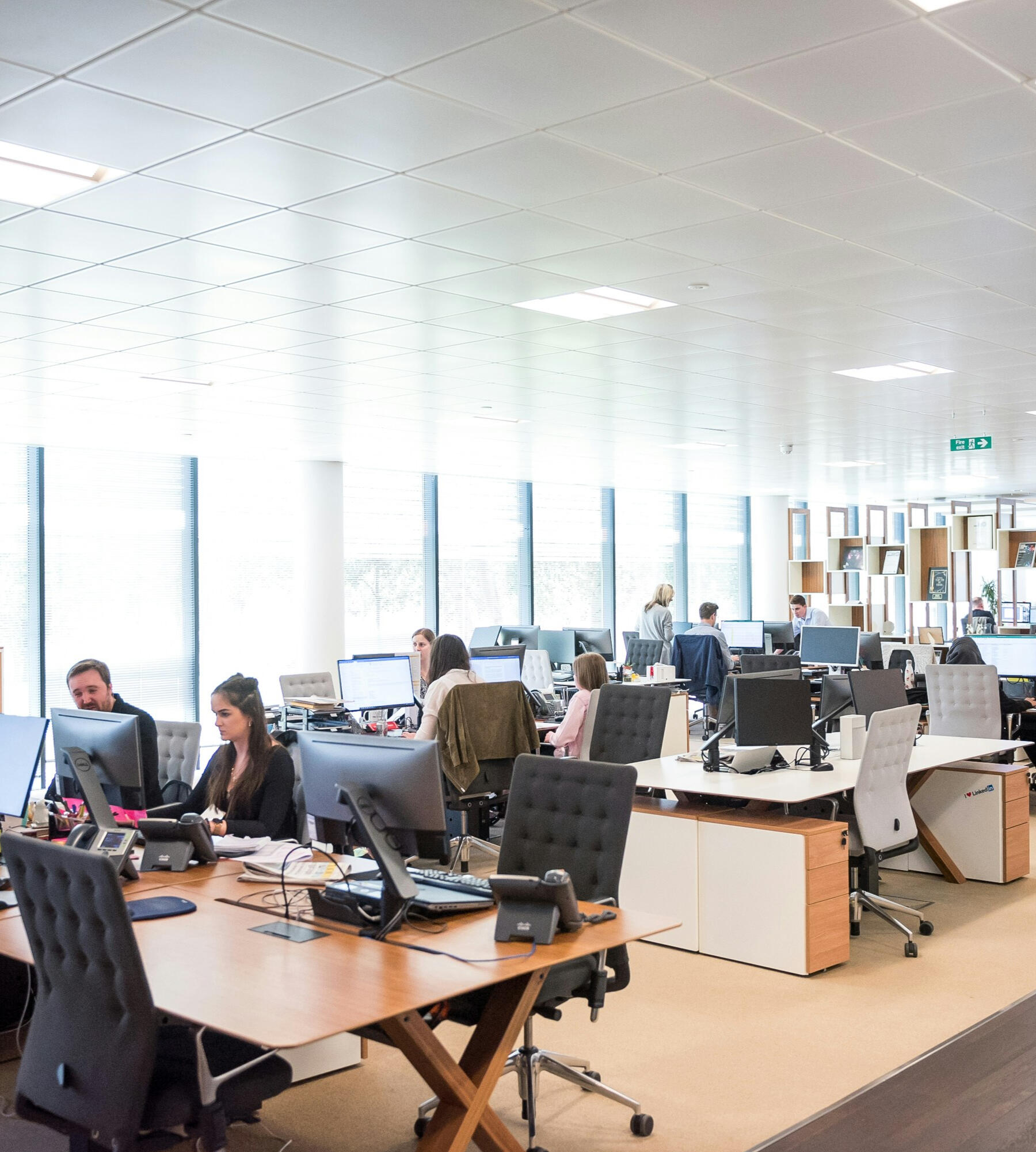 Offshore staffing team collaborating in a professional office setting.